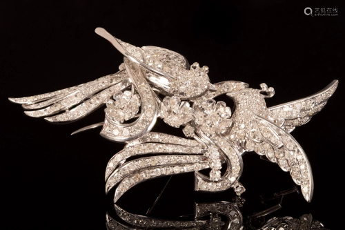 An elegant pair platinum and diamond bird dress clips