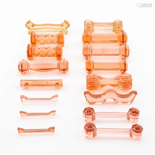 16 SALMON COLORED MISC. GLASS KNIFE RESTS