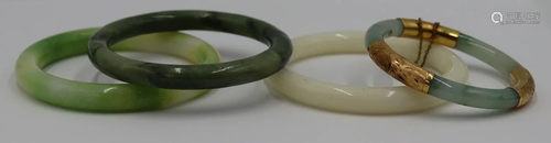 JEWELRY. (4) Possibly Jade Bangle Bracelets.