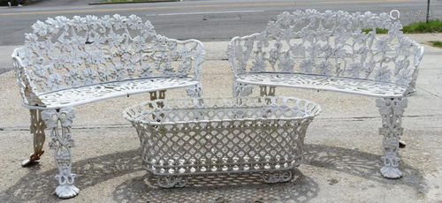 An Antique Pair Of Cast Iron Benches Together