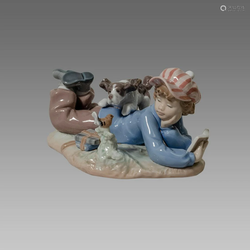 Lladro Boy with Dog Figurine.