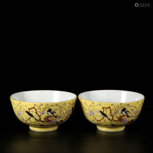 pair of chinese yellow-ground famille rose bowls