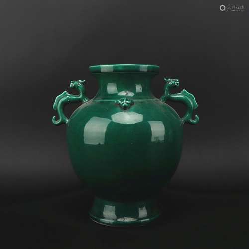 A green glazed 'dragon' jar