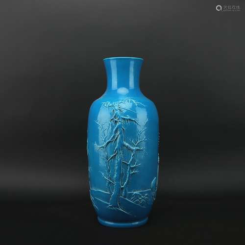 A blue glazed vase