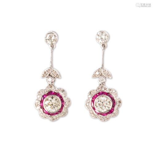 A pair of diamond, ruby and platinum drop earrings
