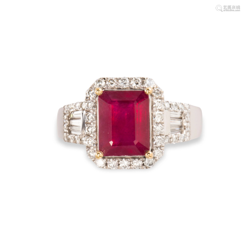 A glass-filled ruby, diamond and fourteen karat white g
