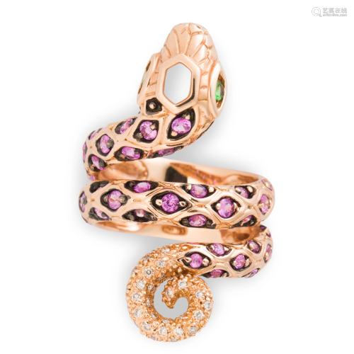 A multi-gemstone and eighteen karat rose gold ring