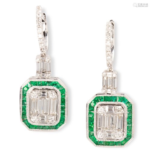 A pair of emerald, diamond and eighteen karat white