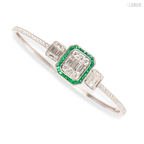 An emerald, diamond and fourteen karat white gold