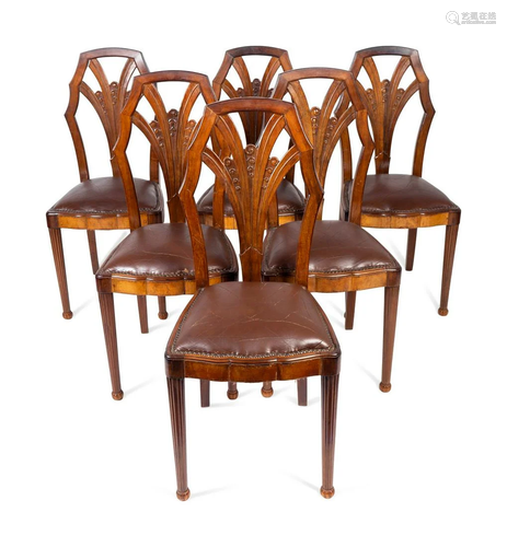 A Set of Six Art Deco Carved Walnut Dining Chairs