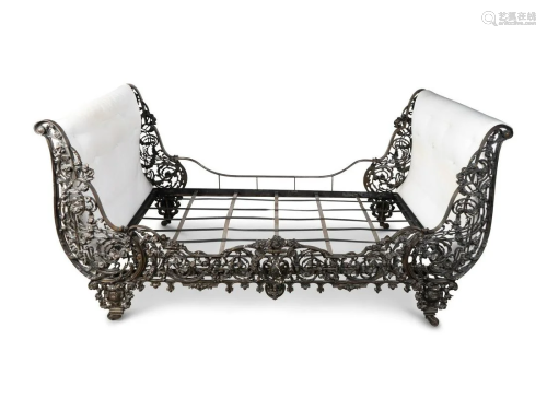 A Continental Cast Iron Sleigh Daybed Height 41 x width