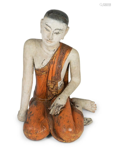 A Thai Polychromed Figure of a Seated Figure Height 35