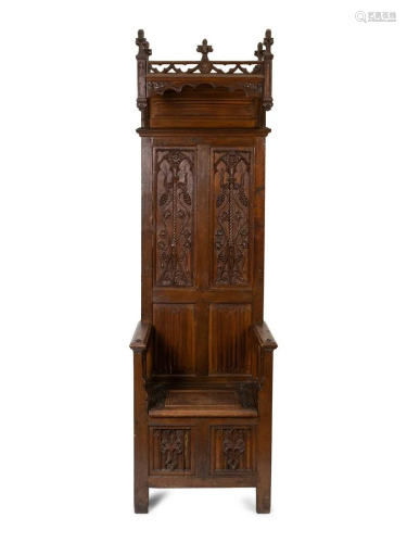 A Jacobean Style Carved Oak Bishops' Chair Height 90 x