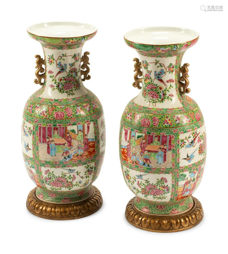 A Pair of Rose Medallion Porcelain Vases on Carved