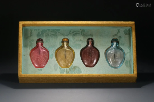 A Set of Four Peking Glass Snuff Bottles