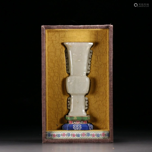 A Carved White Jade Beaker Vase