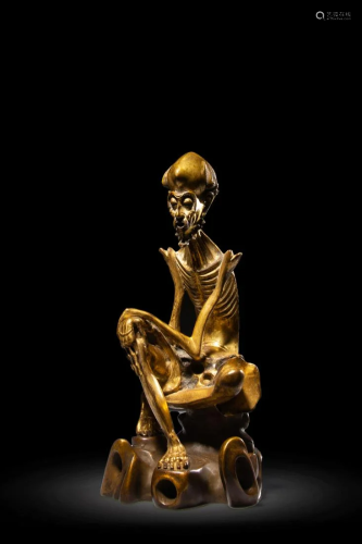A Gilt-bronze Seated That
