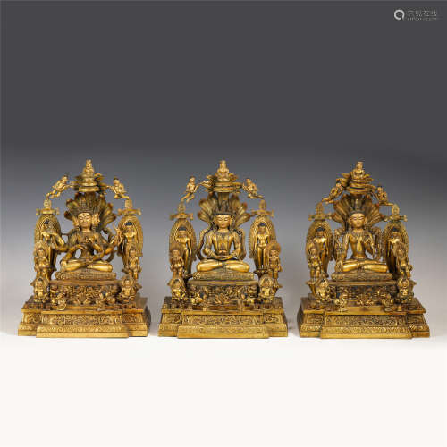 A SET OF THREE GILT BRONZE BUDDHA STATUES