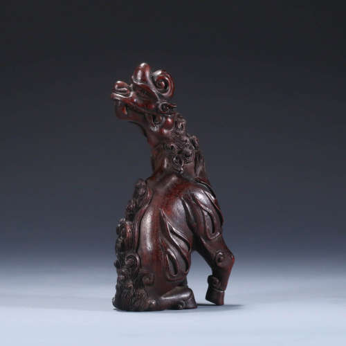 A Red Sandalwood Carved Rhinoceros Ornament