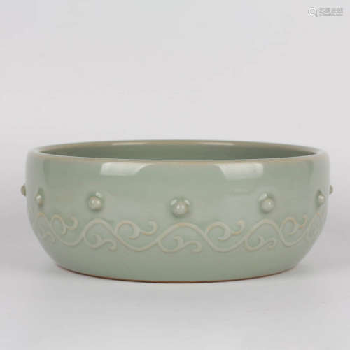 A Celadon-Glazed Relief Porcelain Washer