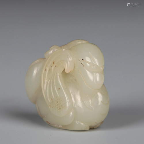 A Carved White Jade Beast