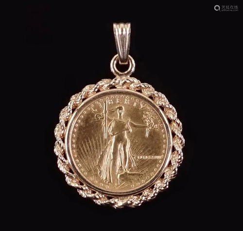 A US $5 1987 Gold Coin Pendant.