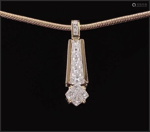 A Diamond Pendant Necklace.