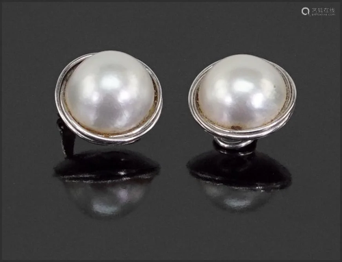 A Pair of Mabe Pearl Earclips.