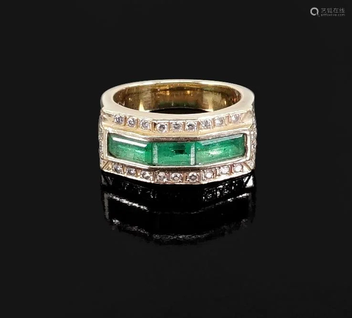 An Emerald & Diamond Ring.