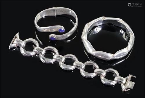 A Mexican Sterling Silver and Lapis Clamper Bracelet.