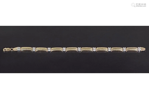 A 14 Karat Gold Bracelet.