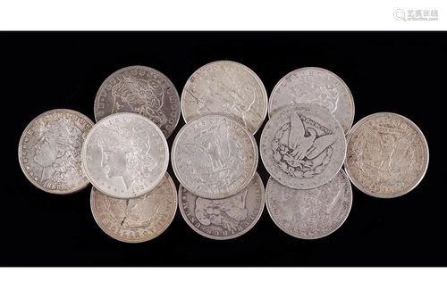 Eleven Morgan Silver Dollars.