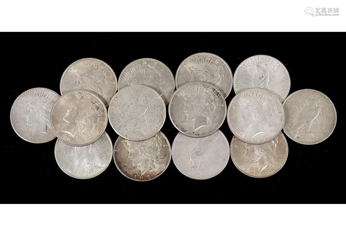 Fourteen Silver Peace Dollars.