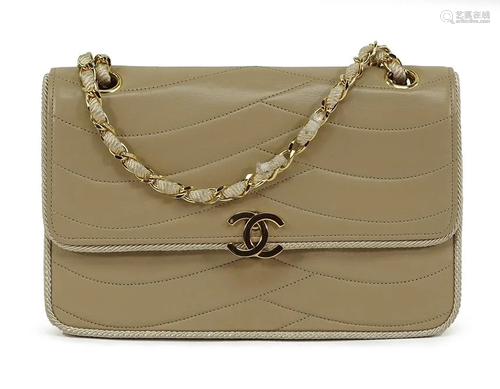 A Chanel Tan Leather Handbag.