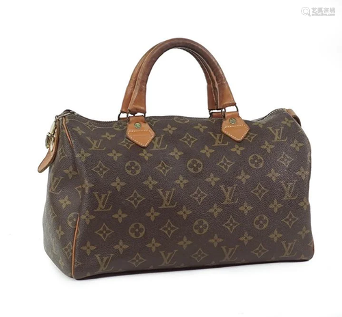 A Louis Vuitton French Company Speedy Handbag.