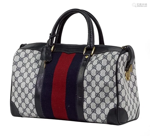 A Gucci Boston Handbag.