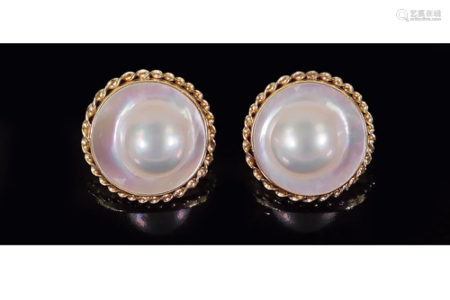 A Pair of Blister Pearl Earrings.