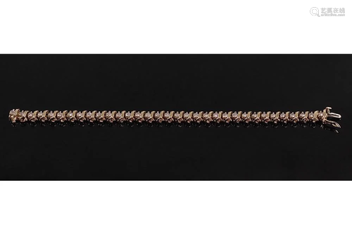 A Diamond Line Bracelet.