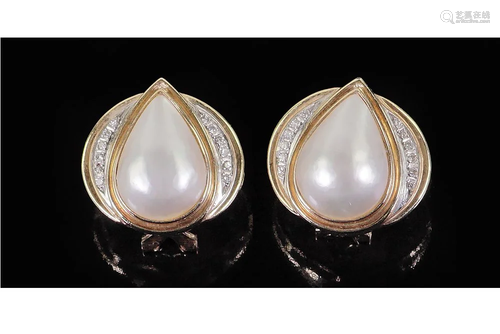 A Pair of Diamond & Mabe Pearl Earrings.