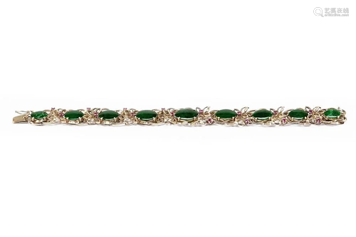 A Jade and Ruby Bracelet.