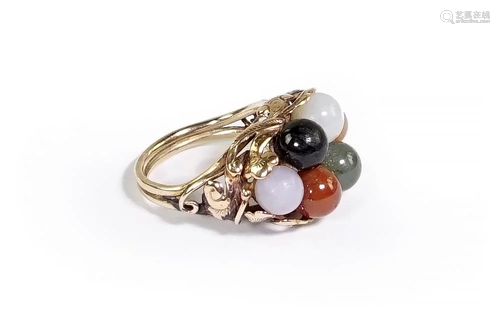 A Jade and 14 Karar Yellow Gold Ring.