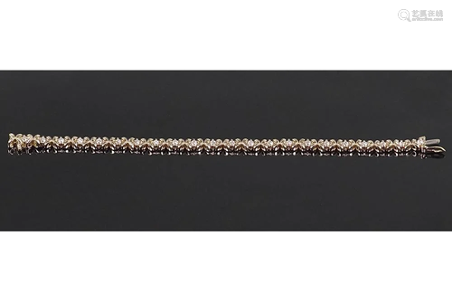 A Diamond Line Bracelet.