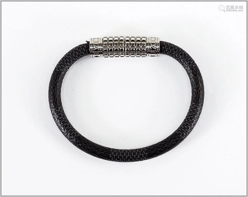 A Louis Vuitton Damier Graphite Digit Bracelet.