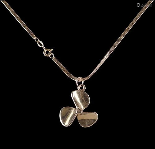 A 14 Karat Yellow Gold Propeller Pendant Necklace.