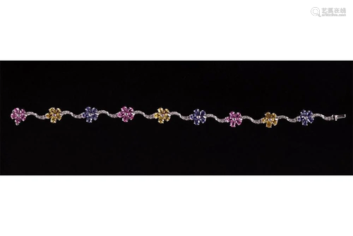 A Multi-Colored Sapphire and Diamond Bracelet.