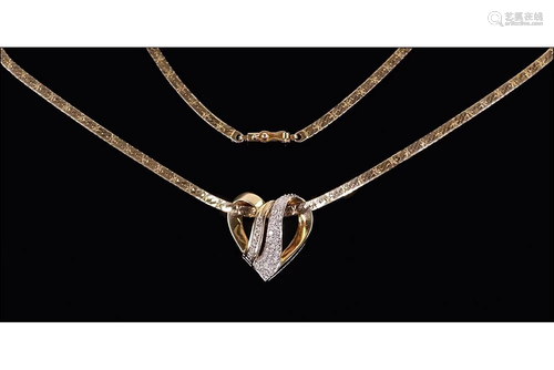 A Diamond Heart Slide Necklace.