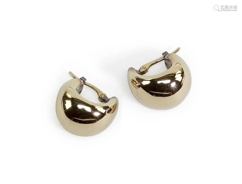 A Pair of 14 Karat Yellow Gold Earrings.