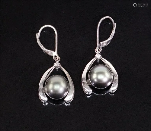 A Pair of Tahitian Pearl Earrings.