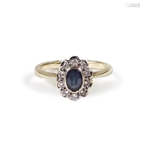 An English Sapphire & Diamond Ring.