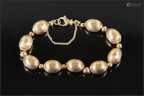 A 14 Karat Yellow Gold Bracelet.